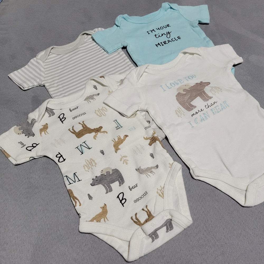4 short sleeved onesies size 0-3 months